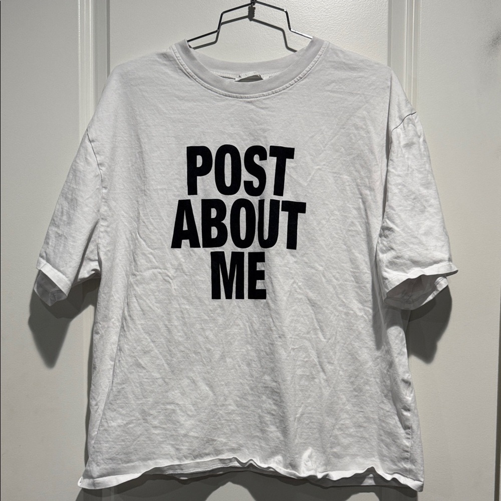 Zara White Graphic T-Shirt with Black Text. Size large.
